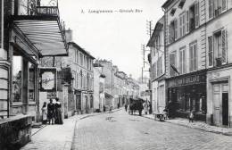 LONGJUMEAU - LA GRANDE RUE - SUPERBE CARTE TRES ANIMEE AVEC NOMBREUX COMMERCES -VINS-TABAC-TELEPHONE- ATTELAGE - TOP !!! - Longjumeau