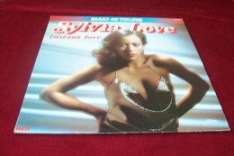 SYLVIA  LOVE  °  INSTANT  LOVE - 45 T - Maxi-Single