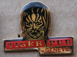 TIGER PUB GENEVE - TETE DE TIGRE - PIN UP - SUISSE - SCHWEIZ - SWITZERLAND - GENEVA - GENF -SVIZZERA -   (GRENAT) - Pin-Ups