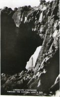 LONGSHIPS LIGHTHOUSE THROUGH THE CAVERN - LAND'S END CORNWALL - Land's End