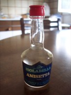 Anisetta Isolabella: Bottiglia Mignon Tappo Plastica. Stab. Milano (liquore) - Licor Espirituoso