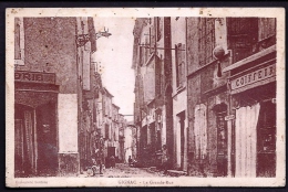 CPA ANCIENNE- FRANCE- GIGNAC (34)- LA GRANDE RUE EN TRES GROS PLAN- ANIMATION- COIFFEUR- - Gignac