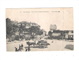 CPA - 93 -  Les Lilas Rond-Point Waldeck-Rousseau 1915 - épicerie Café Billard Animation Attelage Cheval Chien - Les Lilas
