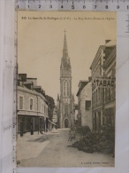 CPA  (35) Ille Et Vilaine  - LA GUERCHE DE BRETAGNE - La Rue Notre Dame Et L'église - La Guerche-de-Bretagne