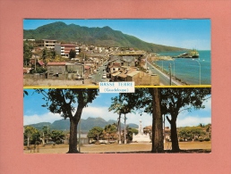 * CPM..( Dépt 971 )..GUADELOUPE :  Ville De Basse Terre . Vue Générale Et Champ D' Arbaud  :   Voir Les 2 Scans - Basse Terre