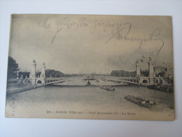 AK / Fotokarte (?) Paris VIIIe Aar. - Pont Alexandre III - La Seine 1904 Verlag C.A.D Paris Frachtschiffe - Bruggen