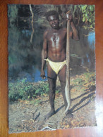 Australian Aborigines. A Tribal Huntsman Returns With A Python For A Meal - Aborigenes