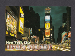 NEW YORK CITY - TIMES SQUARE ILLUMINATED AT NIGHT - Time Square