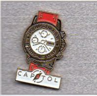 Pin´s  Sport  Automobile,  Montre  CAPITOL  Bracelet Rouge, Sponsor  Du  Rallye  PARIS - DAKAR, PARIS  LE  CAP - Rallye