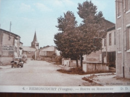 CPA Remoncourt. Vosges.Route De Mirecourt .Auto Café De La Paix . Pub Byrrh - Autres & Non Classés