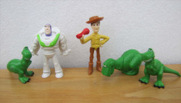 4 Figurines Magic Nestlé Disney : Toy Story : Woody Avec Un Micro - Dino Sur Roulette - Buzz L'éclair - Dino Debout - Disney