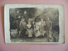 CARTE PHOTO  SAINT LAURENT SUR GORRE    GROUPE DE PERSONNES - ECRITE EN 1914 - Saint Laurent Sur Gorre