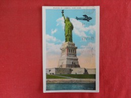 - New York > New York City > Airplane Flying By  Statue Of Liberty   1933 Cancel  -- Ref 1309 - Statue Of Liberty