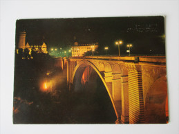 AK / Bildpostkarte Luxembourg Pont Adolphe Et Caisse D'Epargne De L'Etat Illumines - Luxemburg - Town