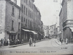 CPA Rive De Gier. Grande Rue Féloin. Magasins Tramway. Animée - Rive De Gier