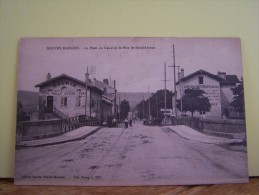 NEUVES MAISONS (MEURTHE ET MOSELLE)  LES COMMERCES. LE PONT DU CANAL ET LA RUE DE NEUFCHATEAU - Neuves Maisons