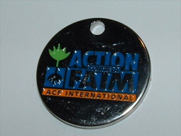 Jeton De Caddies - ACTION CONTRE LA FAIM INTERNATIONAL - Trolley Token/Shopping Trolley Chip