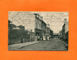 DEUIL LA BARRE    1910   RUE DE LA MAIRIE AVEC COMMERCE EPICERIE  " LES GRANDS ECONOMATS  "    CIRC  NON - Deuil La Barre