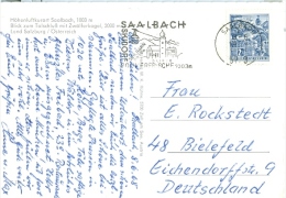 Österreich Saalbach MWST 1968 Skiort Kirche Seilbahn Berge Postkarte Nach Deutschland / Bielefeld - Franking Machines (EMA)