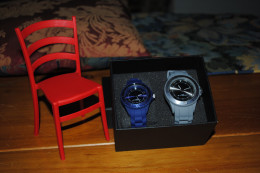 DUO DE MONTRES HOMME-FEMME - Montres Modernes