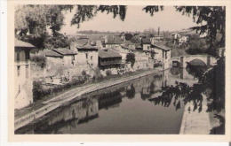 NERAC (47) ? PHOTO AVEC PONT DE PIERRES VIEILLES MAISONS ET COURS D'EAU - Lavardac