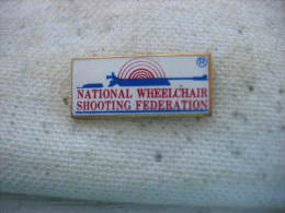 Pin´s  National Wheelchair Shooting Federation (Fédération Nationale De Tirs En Chaise Roulante) - Tir à L'Arc