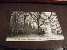 A185..CPA..63..COURPIERE..INSTITUTION SAINT-PIERRE..Façade Nord Et Cour D'Eté....rare Beau Plan Animé...non Ecrite - Courpiere