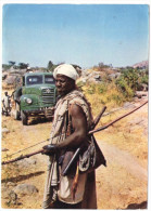 NIGERIA - WEST AFRICAN HUNTER WITH ARCH / ARC / OLD TRUCK - Nigeria