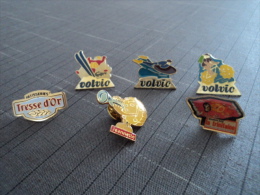 LOT DE 6 PIN'S  VOLVIC/TRESSE D'OR/LA TRINITAINE/JEANNETTE - Loten