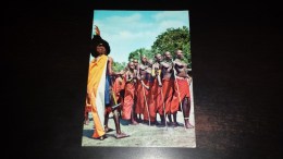 C-18440 CARTOLINA TANZANIA - MASAI DANCERS - COSTUMI TIPICI DANZE MUSICA FOLKLORE DONNE SENI NUDI - Tansania