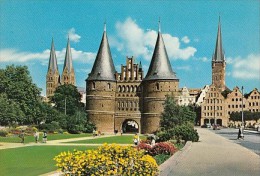 6962- POSTCARD, LUBECK- HOLSTEN TOR GATE, ST MARIEN CHURCH, ST PETER'S CHURCH, CAR - Luebeck