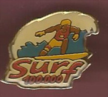 39212-pin's.Jeux Instantanés Surf 100000. - Wasserski