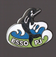 Pin's Esso PJ  (Port Jérome - Dauphin Signé Démons Et Merveilles) - Arthus Bertrand