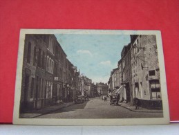 LANDRECIES (NORD) LES COMMERCES. LES VOITURES. LA GRAND-RUE. - Landrecies