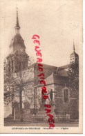 53 - LIGNIERES LA DOUCELLE - L' EGLISE ET LE MONUMENT AUX MORTS - Autres & Non Classés