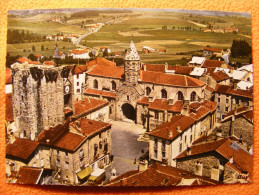 CPSM Saugues (43) - Vue Aérienne - Eglise St Médard Et Tour Des Anglais - Saugues