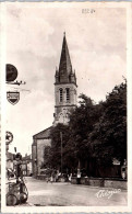 32 NOGARO - L'église Et La Place Du Marché Couvert. - Nogaro