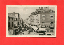 Delcampe - CHOLET  1940   LA RUE NATIONALE AVEC COMMERCES   CIRC   EDITEUR - Cholet
