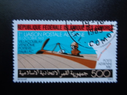 Comores 1987 Poste Aérienne  N°PA249 Oblitéré L'avion Et La Poste - Comoren (1975-...)