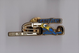 Pin's Formule 1 / Grand Prix 1991 - Pneus Goodyear (signé Arthus Bertrand) - Automovilismo - F1