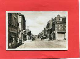 BRIOUZE    1940  RUE DE FLERS AVEC COMMERCES    CIRC OUI EDIT - Briouze