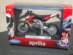 WELLY - APRILIA RXV 450  AVEC SA BOITE Scala 1/18 - Motorcycles