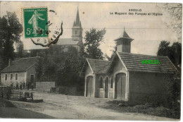 Carte Postale Ancienne De ANOULD – LE MAGASIN DES POMPES ET L'EGLISE - Anould