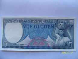 BANCONOTE   SURINAME   5  GULDEN  FIOR DI STAMPA - Surinam