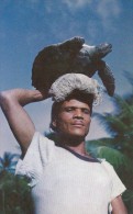 Fisherman Carrying Hawk's Bill Turtle At Balandra Trinidad & Tobago - Trinidad