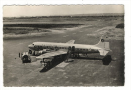 AVIATION  CIVILE  /  UN  DES  DC 6 B.  DE  LA  T.A.I.  ( Opération De Maintenance, Ravitaillement ) - 1946-....: Era Moderna