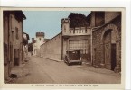 Carte Postale Ancienne Grigny - La Baronnie Et La Rue De Lyon - Grigny