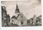 Srquigny (Eure) L'Eglise Et Rue Max Carpentier (n°1 Ed Artaud Neuve) Animée Vélos Mobylettes - Serquigny