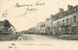 58 - GUERIGNY - LA RUE PRINCIPALE - LES BOUTIQUES - CPA - VOIR 2 SCANS. - Guerigny