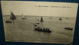 ARES.Promenade Sur Le Bassin.Cpsm,voyagé,be,trous épingle Sur 3 Angles - Arès